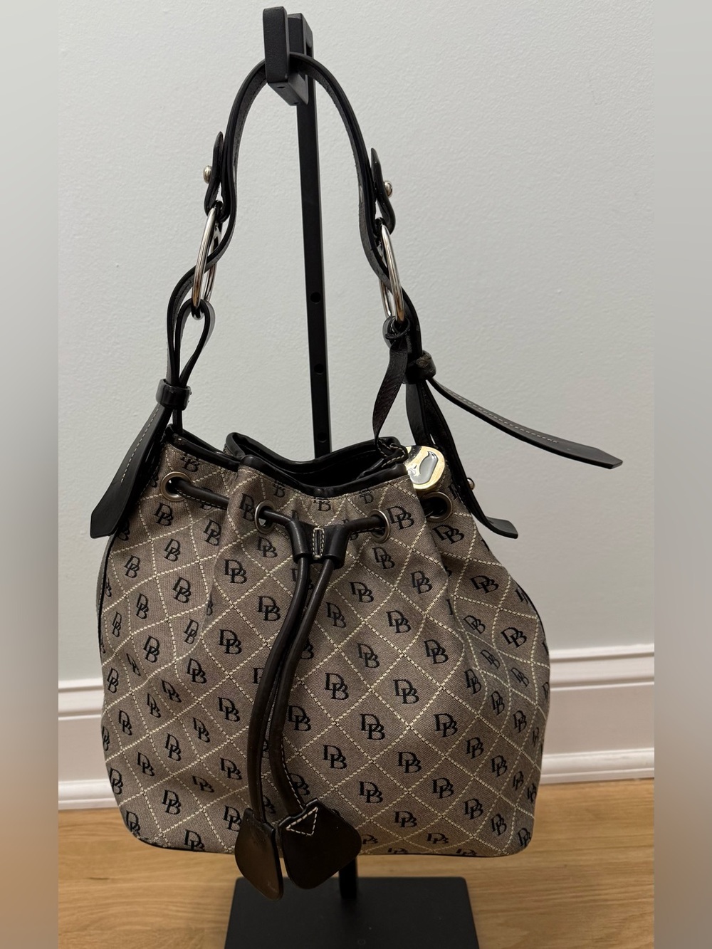 Dooney & Bourke Vintage Signature Monogram Drawstring Bucket Bag